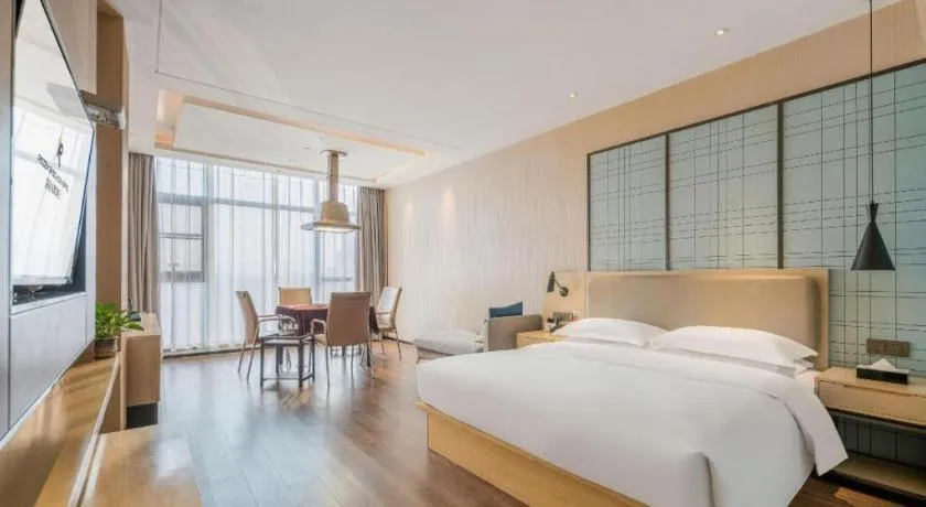 Bed in Echarm Hotel Yiyang Wanda Plaza