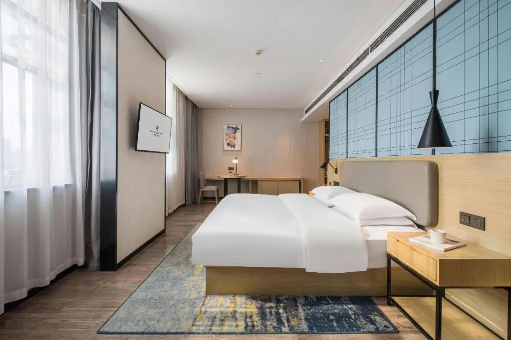 Bed in Echarm Hotel Yiyang Wanda Plaza