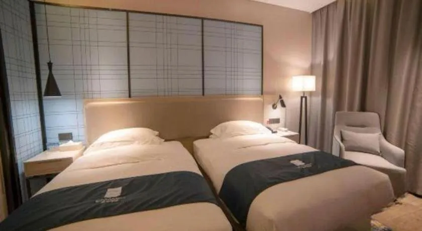 Bed in Echarm Hotel Yiyang Wanda Plaza
