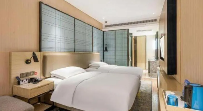 Bed in Echarm Hotel Yiyang Wanda Plaza