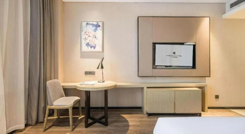 Bed in Echarm Hotel Yiyang Wanda Plaza