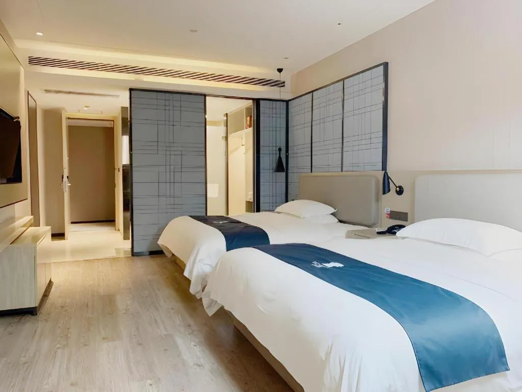 Bed in Echarm Hotel Yiyang Wanda Plaza