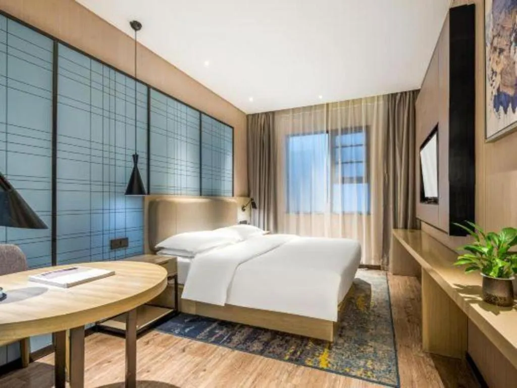 Bed in Echarm Hotel Yiyang Wanda Plaza