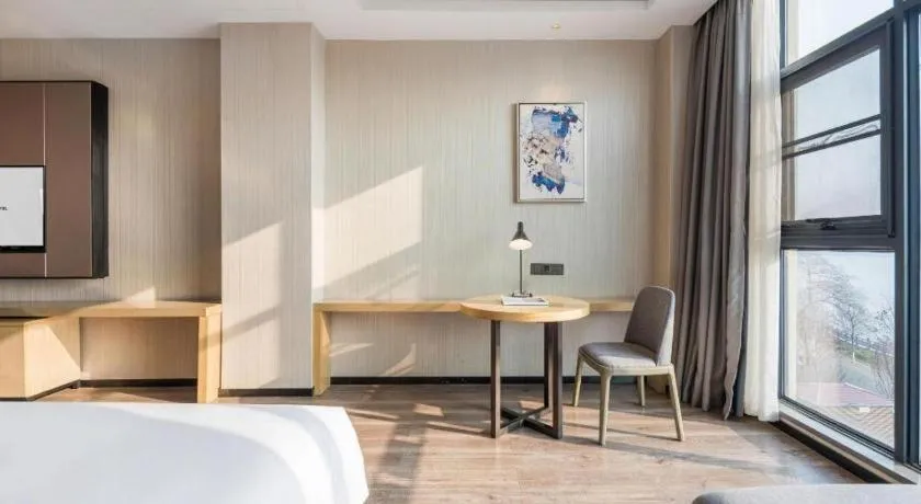 Bed in Echarm Hotel Yiyang Wanda Plaza