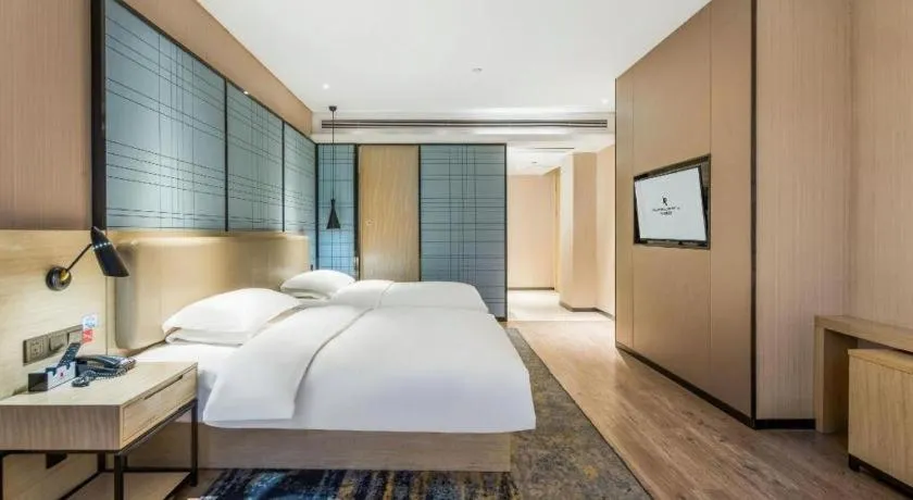 Bed in Echarm Hotel Yiyang Wanda Plaza