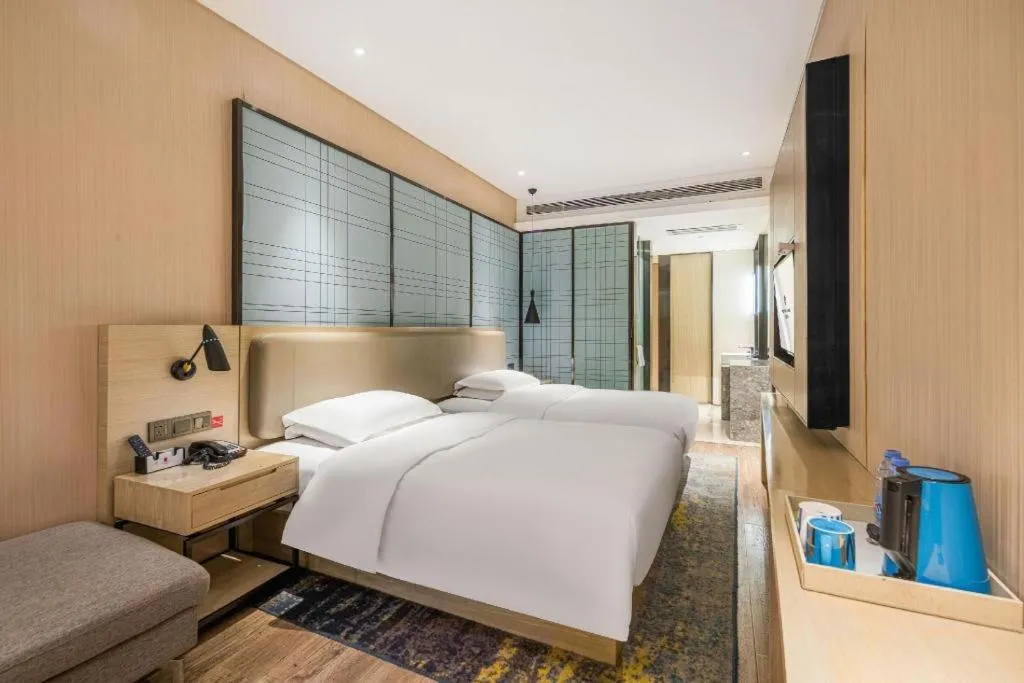 Bed in Echarm Hotel Yiyang Wanda Plaza