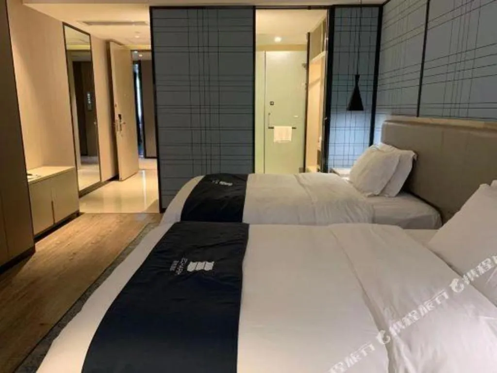 Bed in Echarm Hotel Yiyang Wanda Plaza