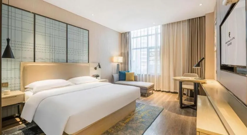 Bed in Echarm Hotel Yiyang Wanda Plaza