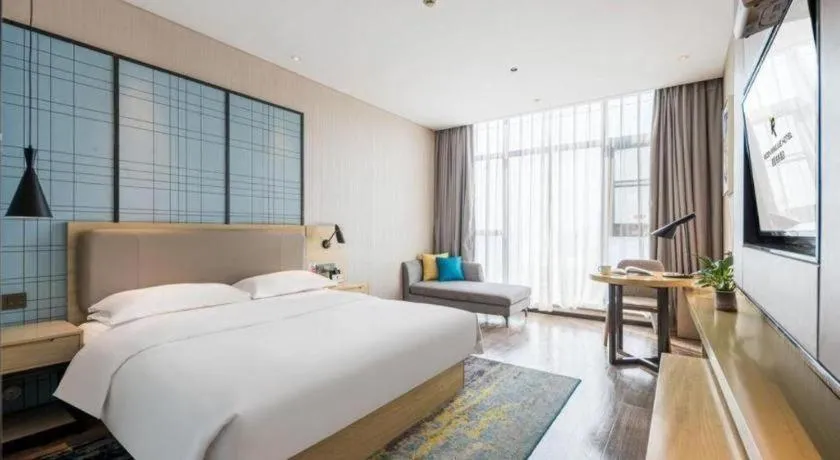 Bed in Echarm Hotel Yiyang Wanda Plaza