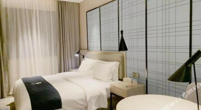 Bed in Echarm Hotel Yiyang Wanda Plaza