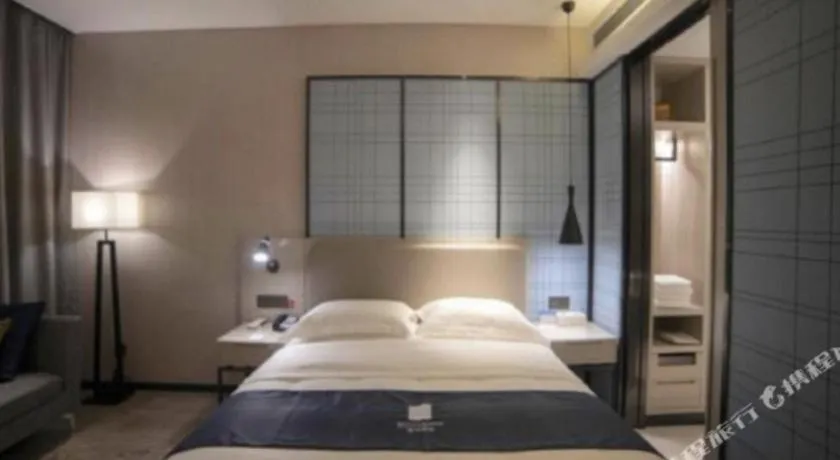 Bed in Echarm Hotel Yiyang Wanda Plaza