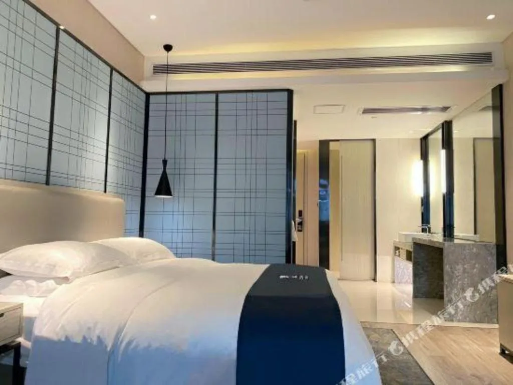 Bed in Echarm Hotel Yiyang Wanda Plaza