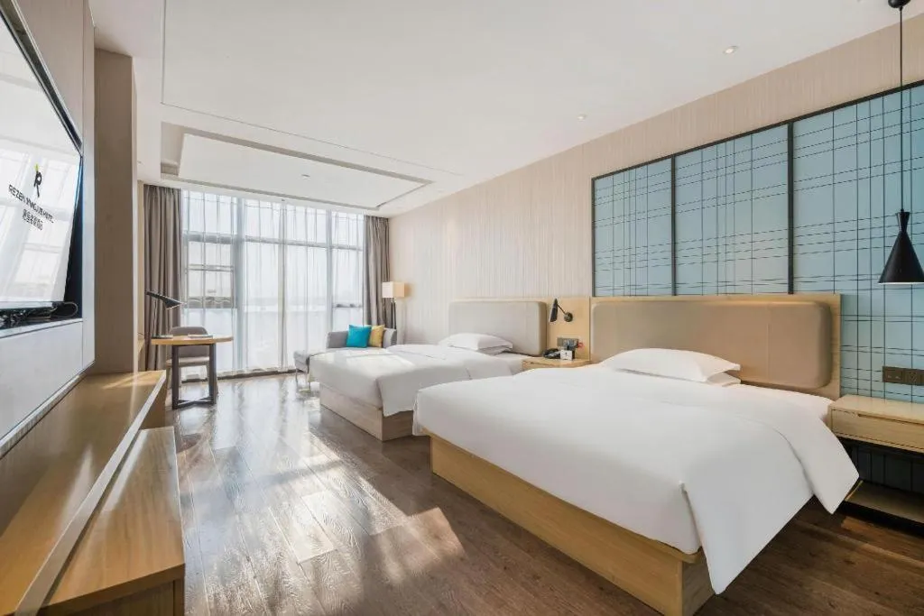Bed in Echarm Hotel Yiyang Wanda Plaza