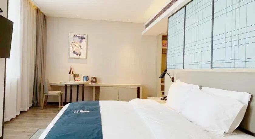 Bed in Echarm Hotel Yiyang Wanda Plaza