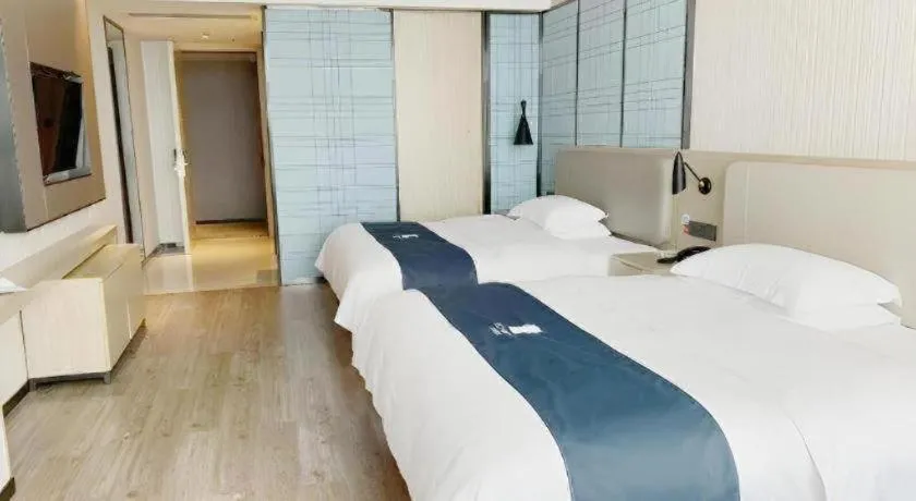 Bed in Echarm Hotel Yiyang Wanda Plaza