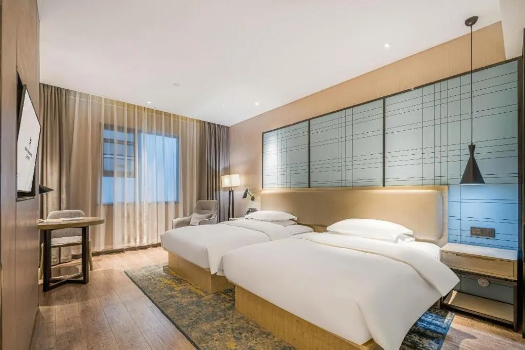 Bed in Echarm Hotel Yiyang Wanda Plaza
