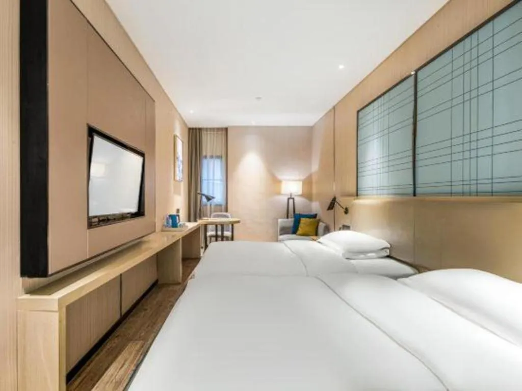Bed in Echarm Hotel Yiyang Wanda Plaza
