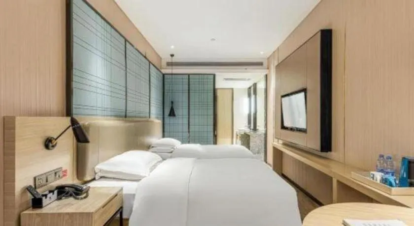 Bed in Echarm Hotel Yiyang Wanda Plaza