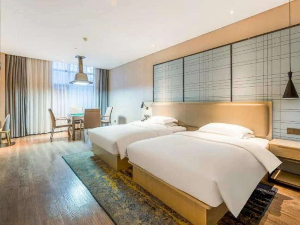 Bed in Echarm Hotel Yiyang Wanda Plaza
