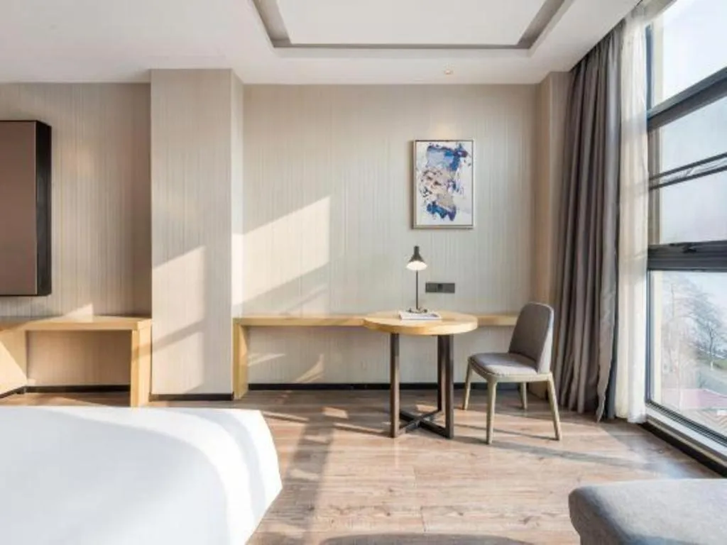 Bed in Echarm Hotel Yiyang Wanda Plaza