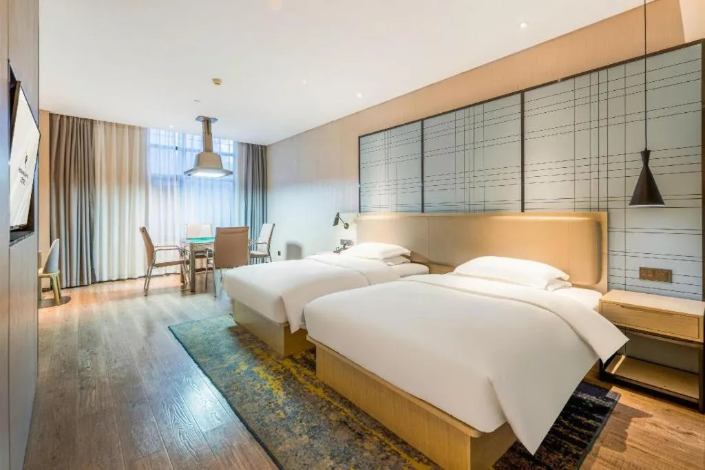 Bed in Echarm Hotel Yiyang Wanda Plaza