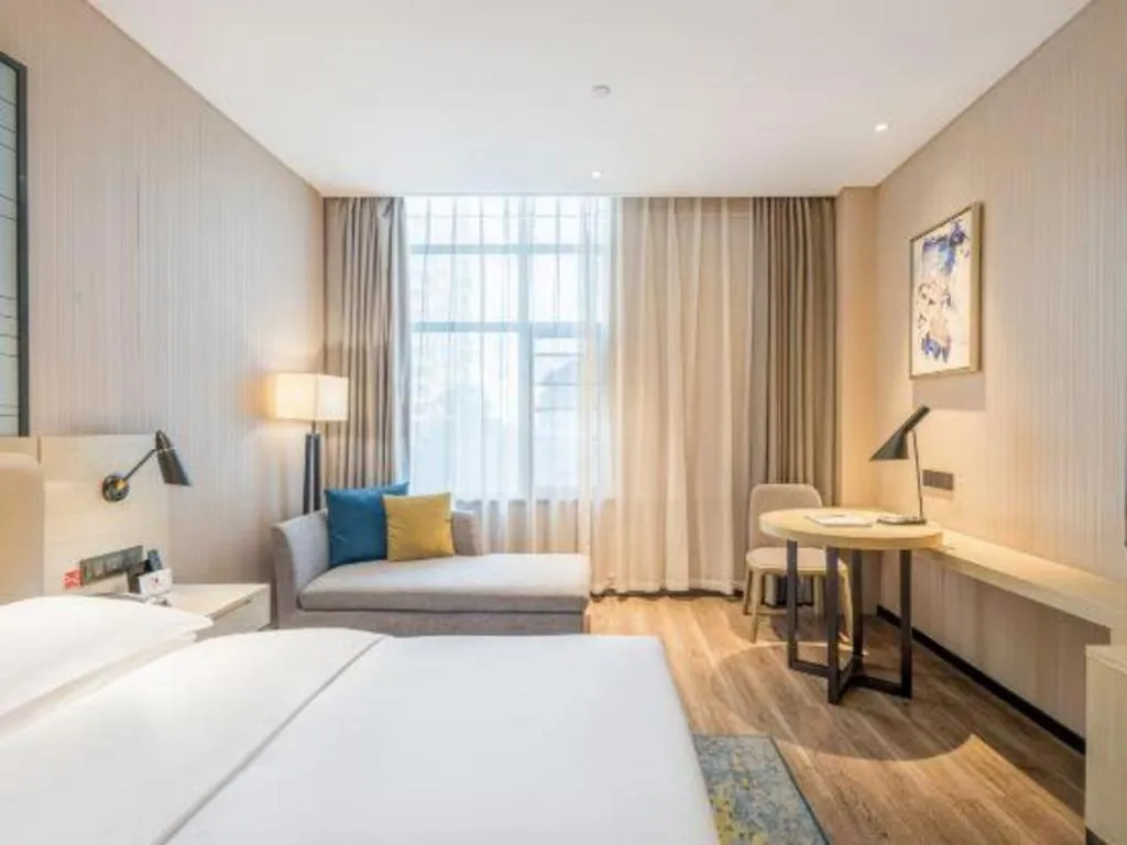 Bed in Echarm Hotel Yiyang Wanda Plaza