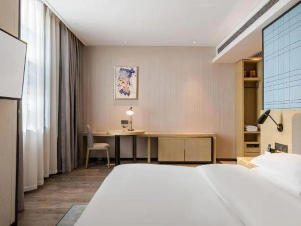 Bed in Echarm Hotel Yiyang Wanda Plaza
