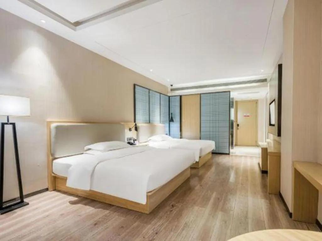 Bed in Echarm Hotel Yiyang Wanda Plaza