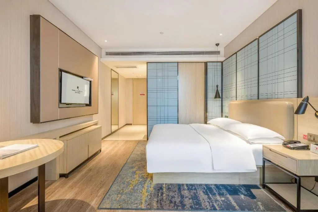 Bed in Echarm Hotel Yiyang Wanda Plaza