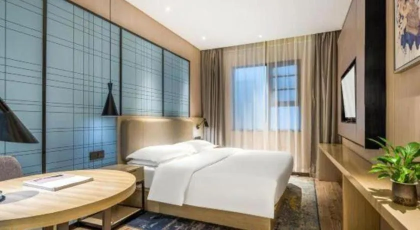 Bed in Echarm Hotel Yiyang Wanda Plaza