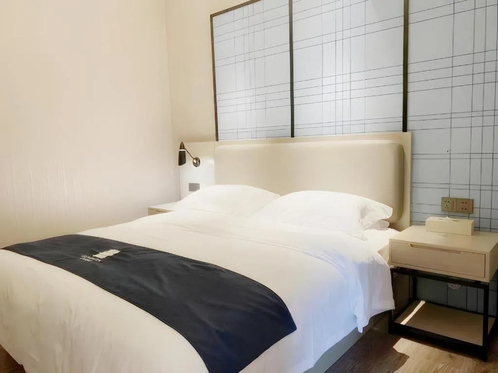 Bed in Echarm Hotel Yiyang Wanda Plaza