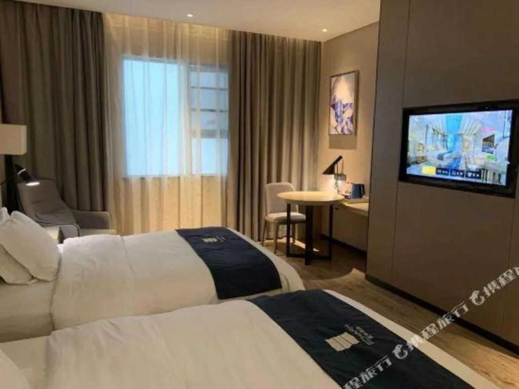 Bed in Echarm Hotel Yiyang Wanda Plaza