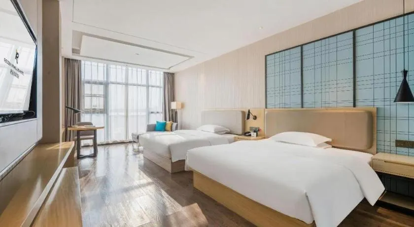 Bed in Echarm Hotel Yiyang Wanda Plaza