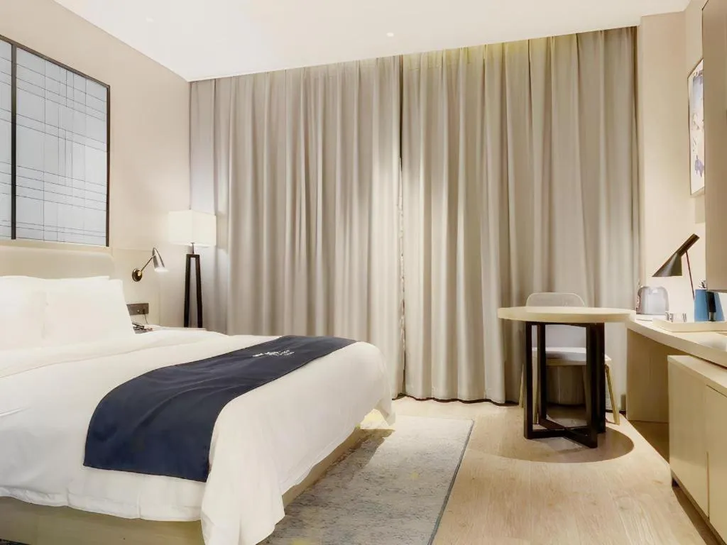 Bed in Echarm Hotel Yiyang Wanda Plaza