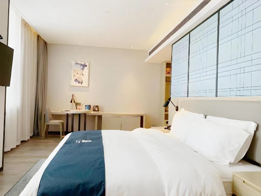 Bed in Echarm Hotel Yiyang Wanda Plaza