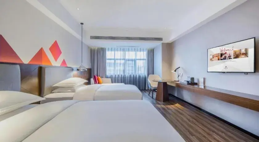 Bed in Borrman Hotel Qianjiang High-speed Railway Station Lobster City Bed in Borrman Hotel Qianjiang High-speed Railway Station Lobster City