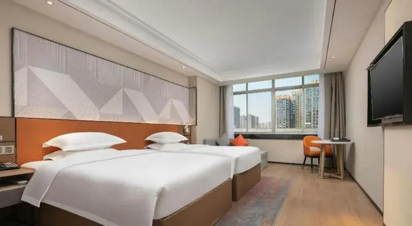 Bed in Borrman Hotel Qianjiang High-speed Railway Station Lobster City Bed in Borrman Hotel Qianjiang High-speed Railway Station Lobster City