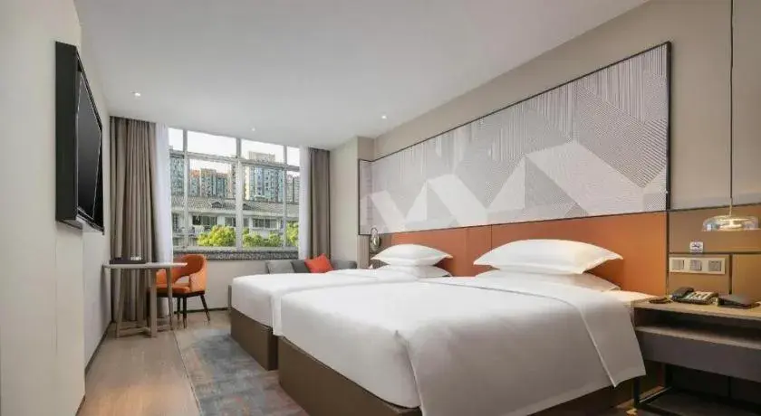 Bed in Borrman Hotel Qianjiang High-speed Railway Station Lobster City Bed in Borrman Hotel Qianjiang High-speed Railway Station Lobster City