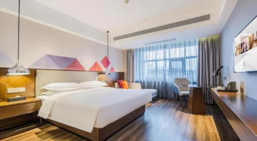 Bed in Borrman Hotel Qianjiang High-speed Railway Station Lobster City Bed in Borrman Hotel Qianjiang High-speed Railway Station Lobster City