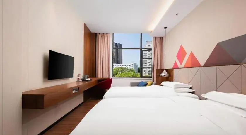 Bed in Borrman Hotel Qianjiang High-speed Railway Station Lobster City Bed in Borrman Hotel Qianjiang High-speed Railway Station Lobster City