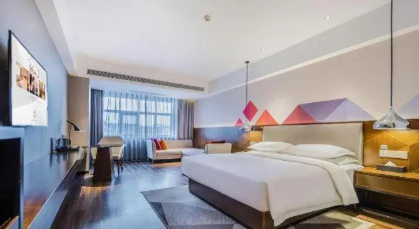 Bed in Borrman Hotel Qianjiang High-speed Railway Station Lobster City Bed in Borrman Hotel Qianjiang High-speed Railway Station Lobster City