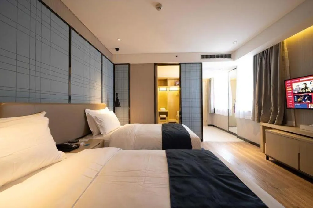 Bed in Echarm Hotel Xian Ming City Wall South Gate