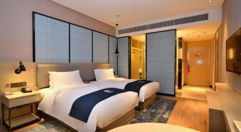 Bed in Echarm Hotel Xian Ming City Wall South Gate