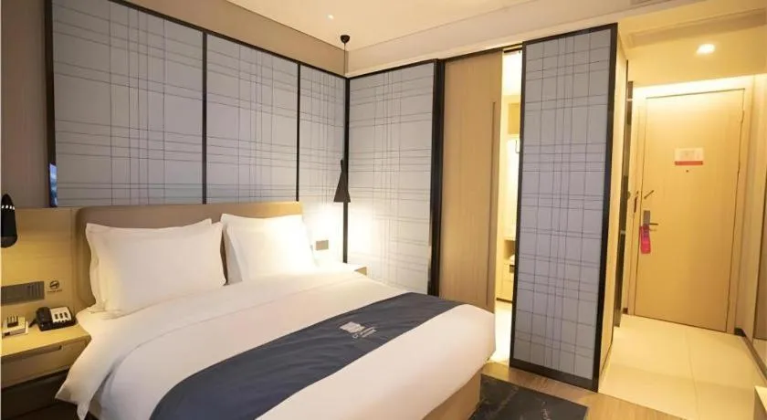 Bed in Echarm Hotel Xian Ming City Wall South Gate