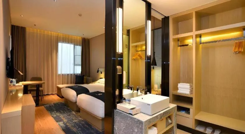 Bed in Echarm Hotel Xian Ming City Wall South Gate