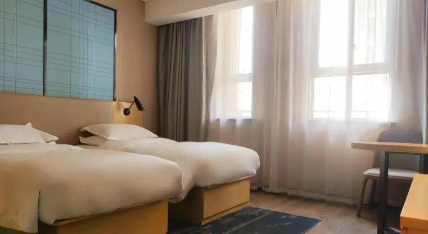 Bed in Echarm Hotel Xian Ming City Wall South Gate