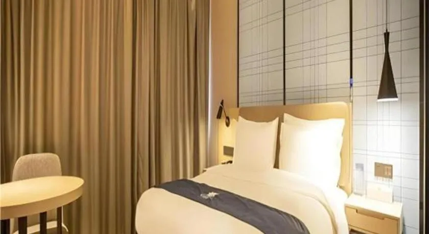 Bed in Echarm Hotel Xian Ming City Wall South Gate