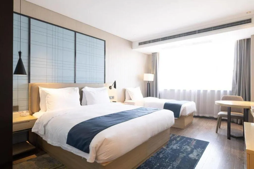 Bed in Echarm Hotel Xian Ming City Wall South Gate