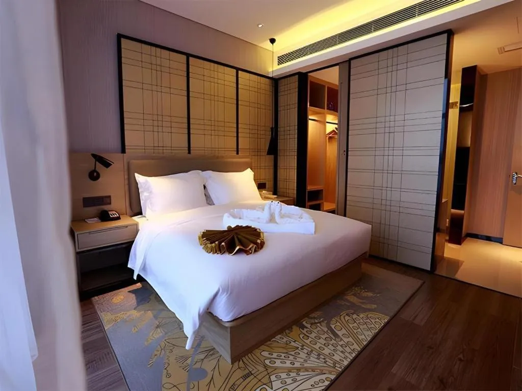 Bed in Echarm Hotel Changsha Gaoqiao