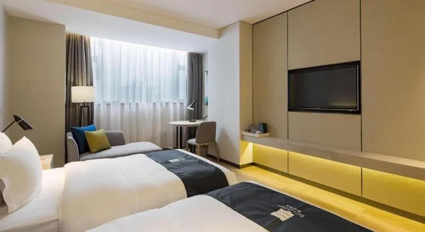 Bed in Echarm Hotel Changsha Gaoqiao